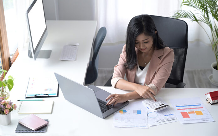 Accountant-processing-leave-claims-and-payroll-in-integrated-system Accountant processing leave claims and payroll in integrated system