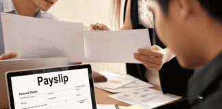 employee viewing digital payslip on laptop during payroll processing