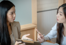 How to Choose Affordable HR Software With Security and Support HR professional providing software support and guidance to client.