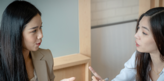 HR professional providing software support and guidance to client.