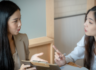 How to Choose Affordable HR Software With Security and Support HR professional providing software support and guidance to client.